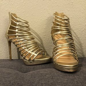 Metallic gold strappy platform pumps